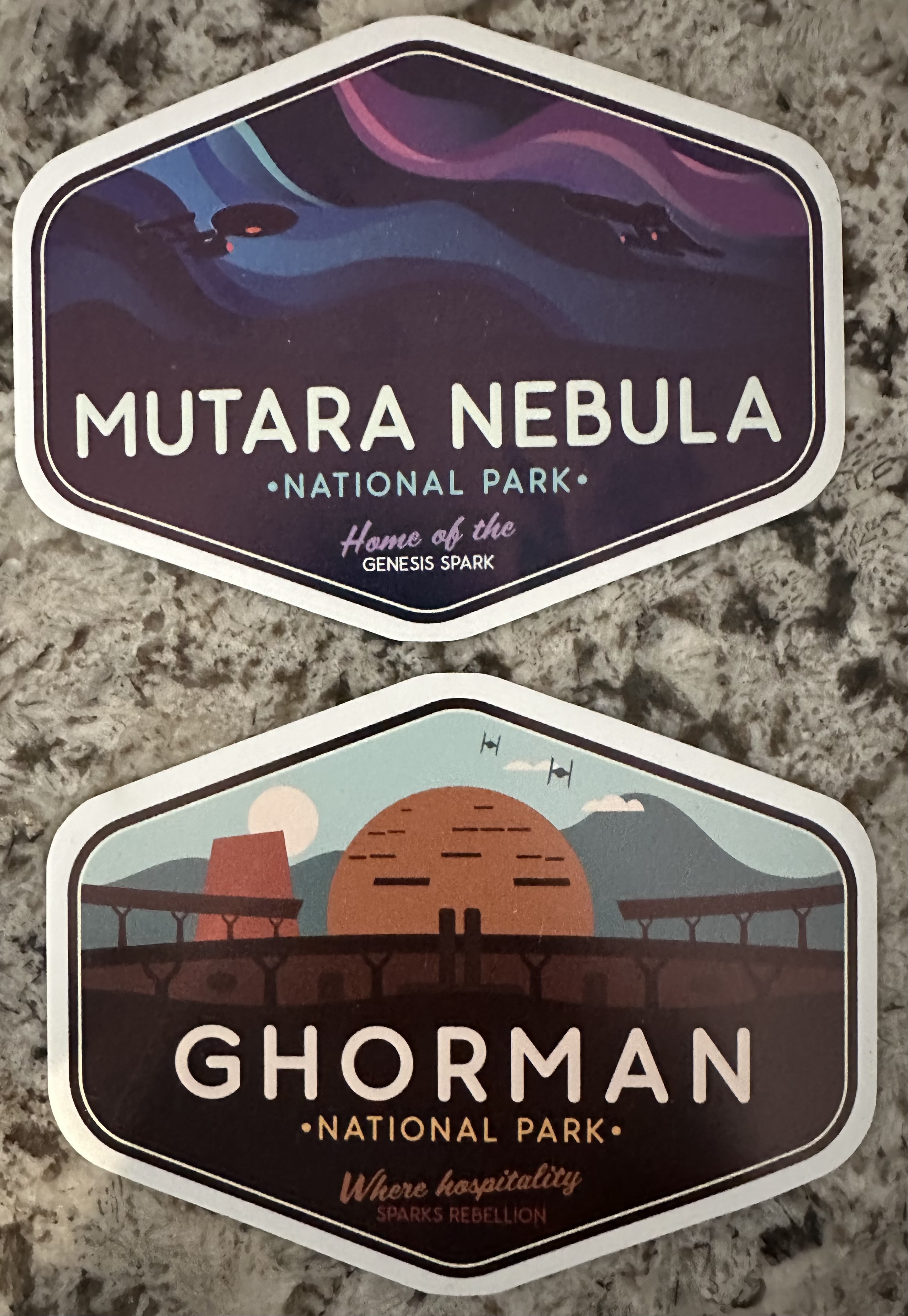 Two magnets, one for the “Mutara Nebula National Park” and the second for “Ghorman National Park.”